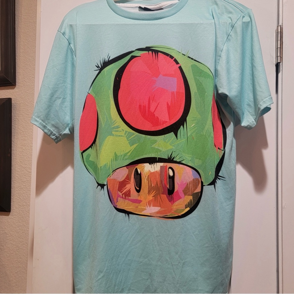 Graphic psychedelic iEDM.com T-Shirt with Green and Red Mushroom “Toad” Design